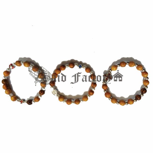 olive wood elastic bracelet with gold plastic beads and charm cross pendant