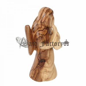 Olive wood angel playing flute